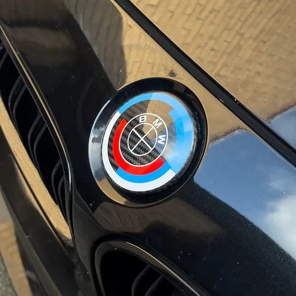 BMW-50th-Anniversary-Carbon-Fibre-Badge-Overlays-Twenty-Two-Tuning-XXIITUNING-Original-1.webp