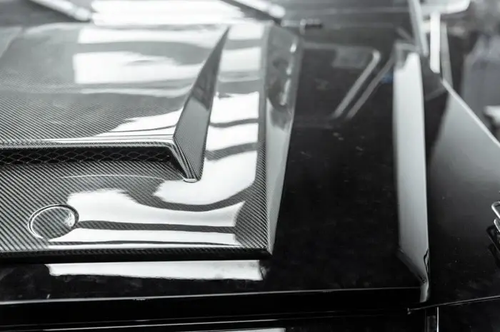 mercedes-benz-g-class-g55-g63-w463-brabus-style-carbon-fibre-bonnet-hood-replacement-XXIITUNING-3_28cb62ce-d51c-478.webp