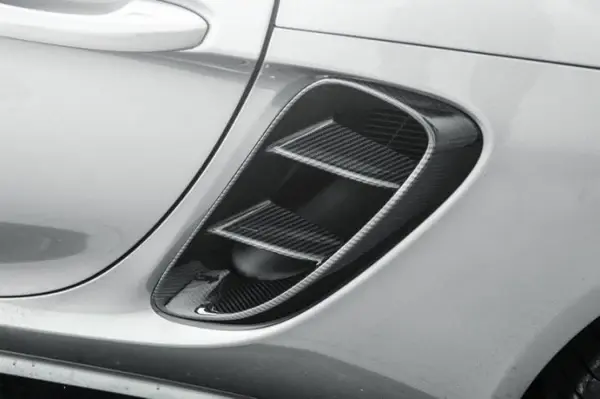 porsche-cayman-boxter-718-carbon-fibre-intake-vent-trims-XXIITUNING-1_07a093bf-fff4-4d59-b129-bd8eec912204.webp