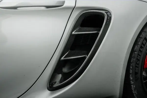 porsche-cayman-boxter-718-carbon-fibre-intake-vent-trims-XXIITUNING_3fa6dddb-eabb-4353-9555-dde757d5e961 (1).webp