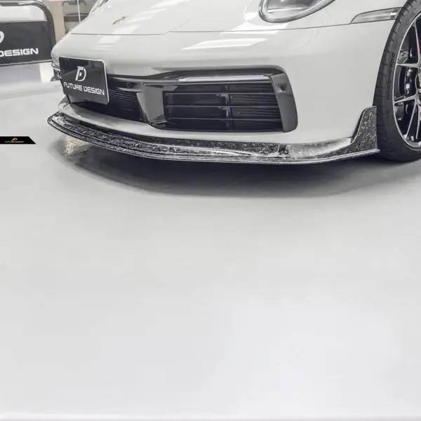 porsche-carrera-992-911-future-design-carbon-fibre-front-lip-XXIITUNING-9_39097979-28e2-485f-98b7-7c5090ba8e52.webp