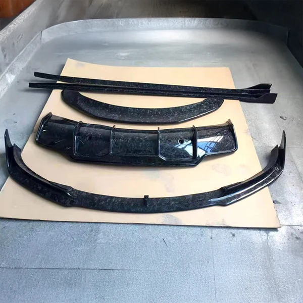 tesla-model-3-5yj3-vorsteiner-style-forged-carbon-fibre-full-kit_ec6945c5-0f6a-400b-92bc-da85e724cb1d.webp