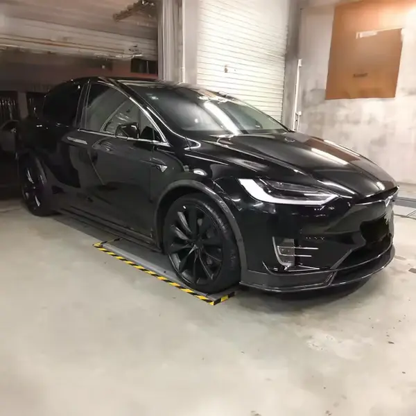 tesla-model-x-1st-gen-oem-style-carbon-fibre-fender-trim-overlays-XXIITUNING_54d4c1a1-6aeb-4e90-964f-3109d84630d7.webp